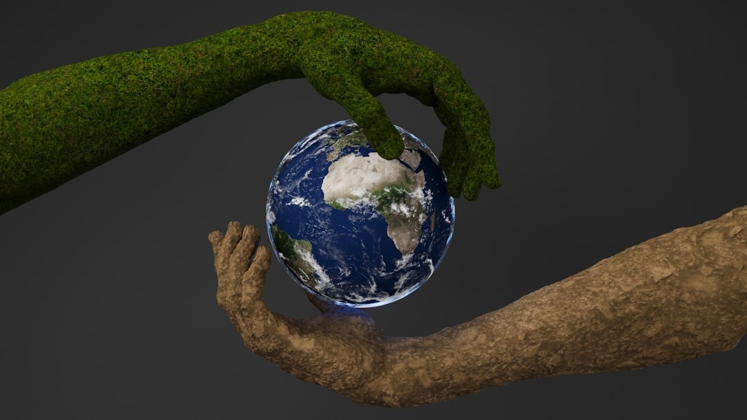 ymbolic concept of sustainability addressing e-waste impact on environment with hands holding planet Earth.