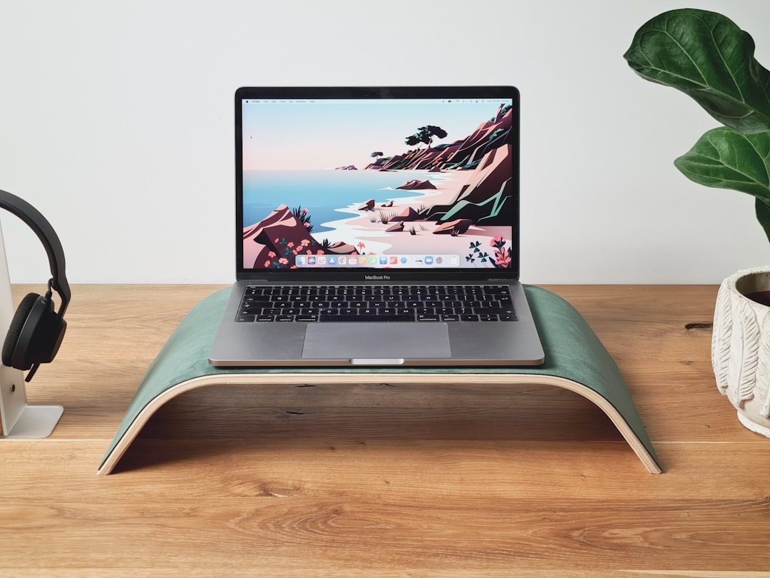 Circular economy in technology represented by laptop with recycling arrows